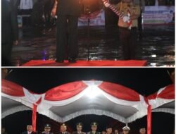 Tradisi Menyambut Kemerdekaan RI, Dandim 1004 Kotabaru Gelar Upacara Taptu dan Pawai Obor di wisata Siring Laut