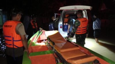 Terjang Banjir di Tengah Malam, Aipda Edwien Evakuasi Ibu Hamil ke RS Balangan